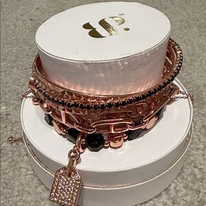 Bomb Party bracelet stack Take Me Anywhere with You in rose gold and black onyx